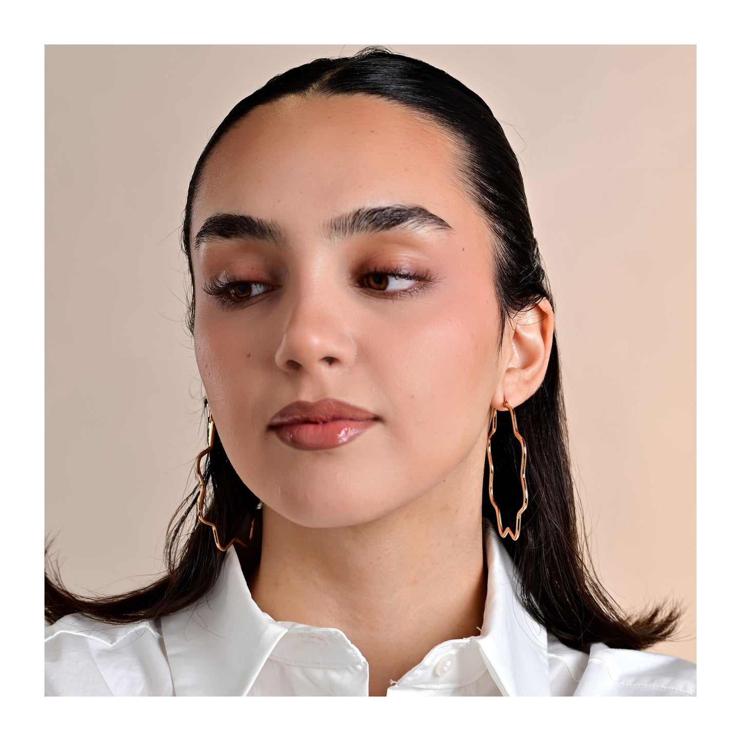 Damen Ohrringe – Creole Blume aus Edelstahl