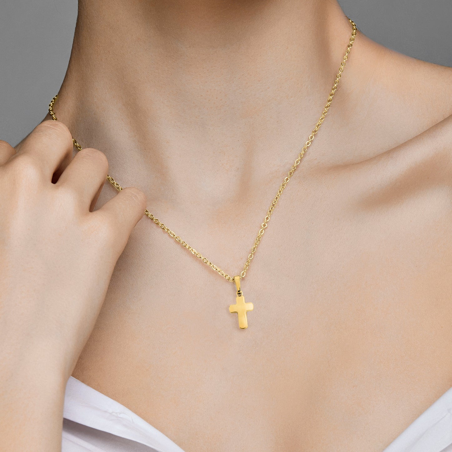 One Element  Kreuz Anhänger aus 333 Gelbgold